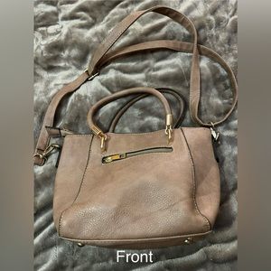 Small tan/beige handbag/purse. Used w/normal usage damage/scratches. No holes.